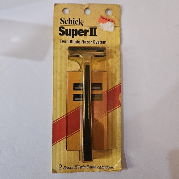 Schick Other - VINTAGE SCHICK SUPER II TWIN BLADE RAZOR W/2 Razors. 1970 Discolored Package NEW